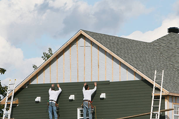 Professional Emergency Siding Repair technician working in Yorkville, OH
